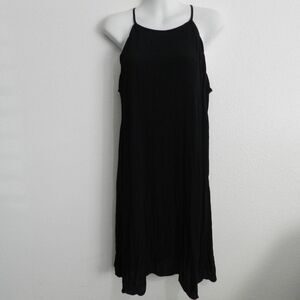 High neck trapeze style sundress with scalloped arm openings and hemline, black